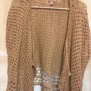 Tan knitted vest CB .
